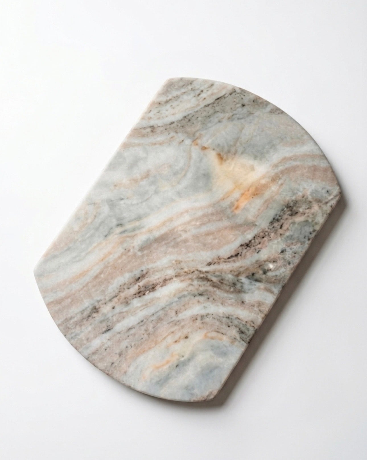 Hexagonal marble cutting board on a white background