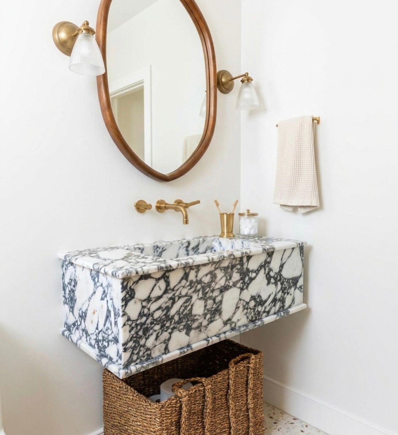 Vyasaara - Bathroom with marble sink .